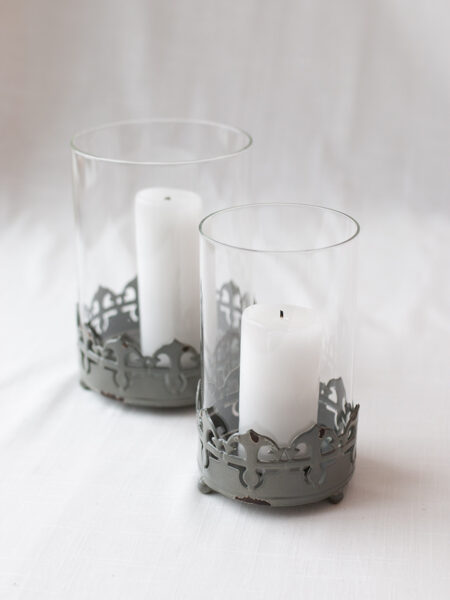 Svečturis ar metāla palikni un stikla uzlikni 